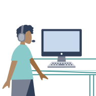 A person wearing a headset in front of a computer