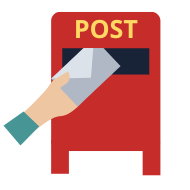 A hand posting a letter in a post box