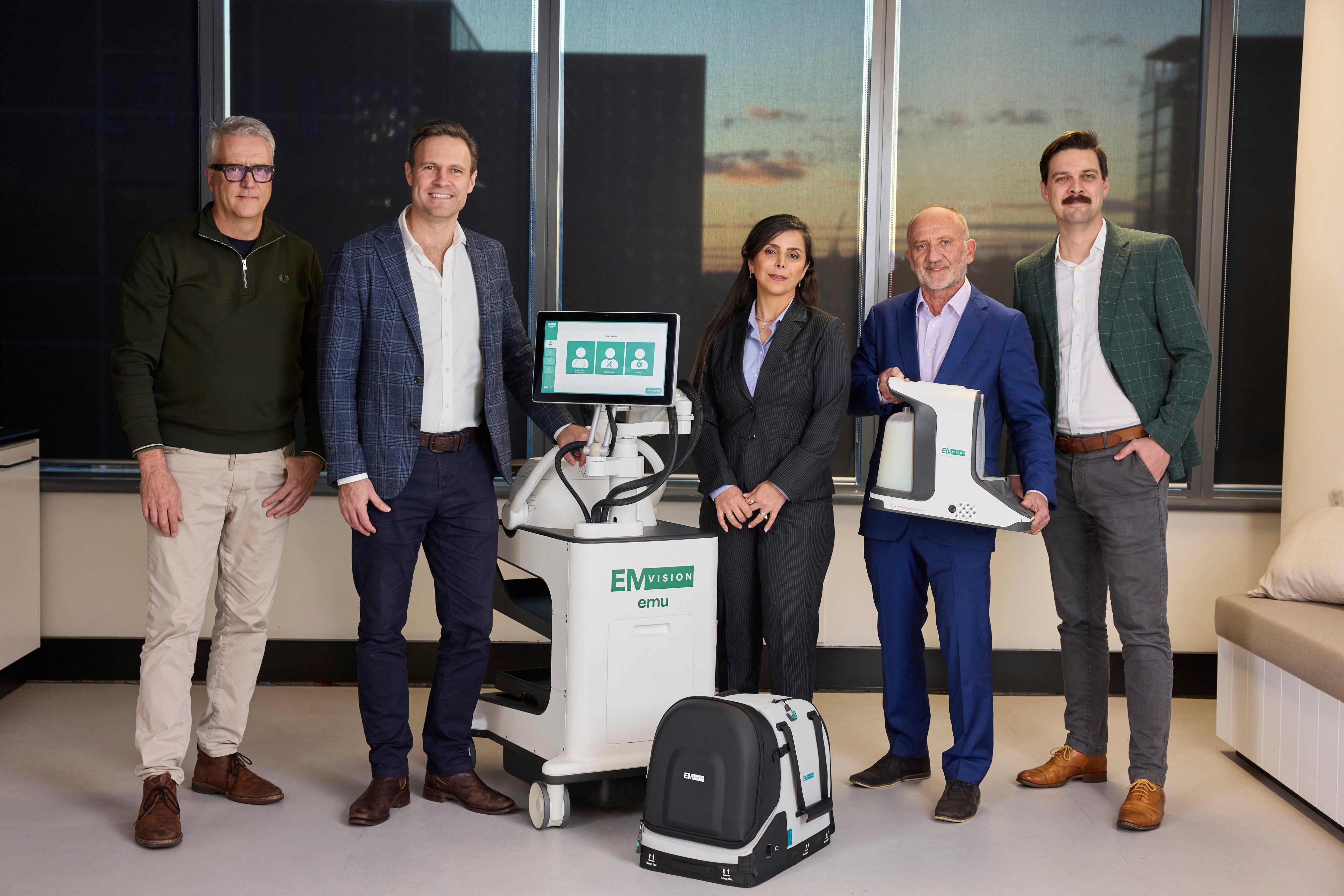 The EMVision team consisting of five people, along with the Emu device and the first responder device.